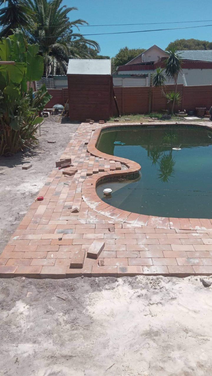 Pool area with brick paving
